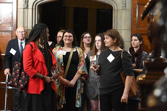 图为一群2024欧洲杯官方投注的女生, coming together at a networking event for the Center for Women's Entrepreneurship. 